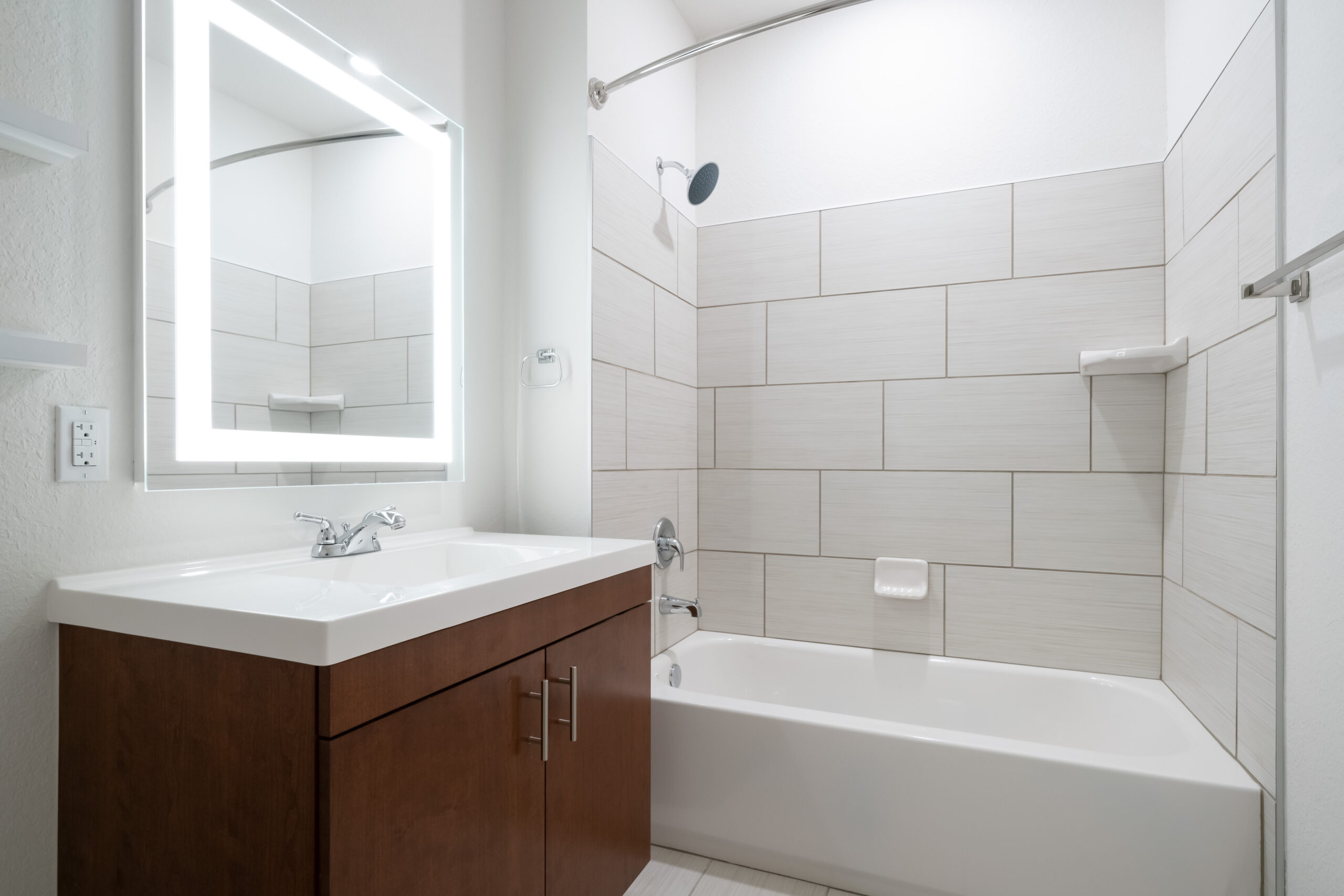 Designer bathrooms with full size LED mirror