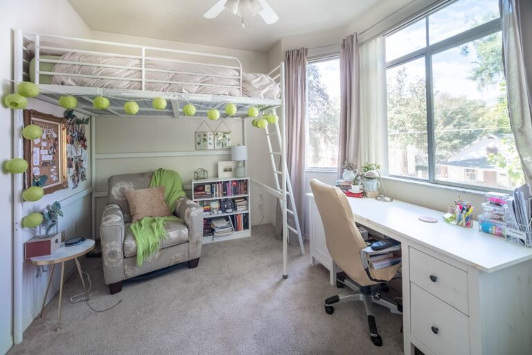 This bedroom has a large bay window and en-suite bathroom