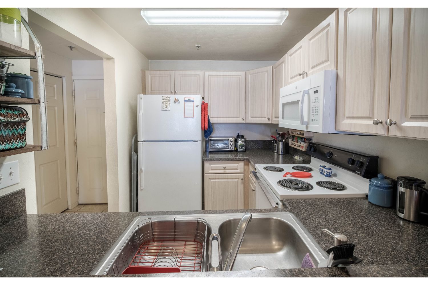 These apartments are upgraded with oversized tile floors, granite style countertops, soft-touch drawers, new cabinetry, appliances, fixtures and more!