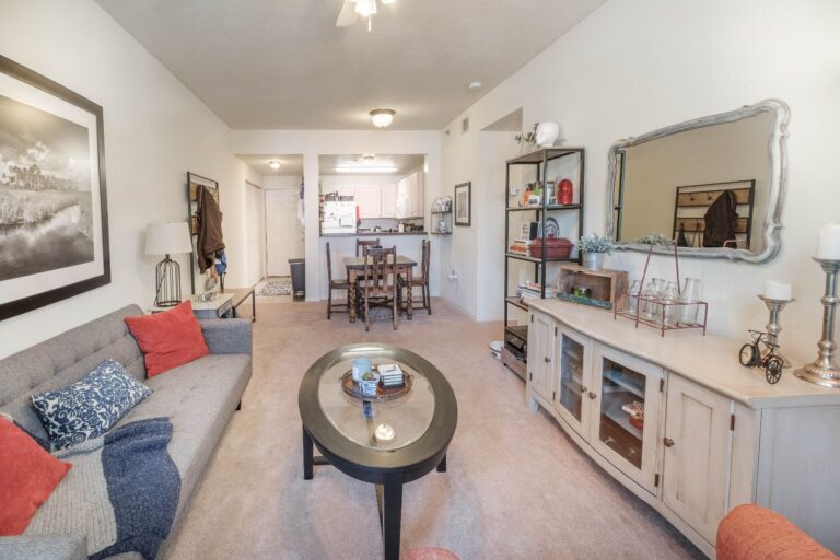 Living/dining room with large bay window