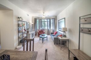 Living/dining room with large bay window