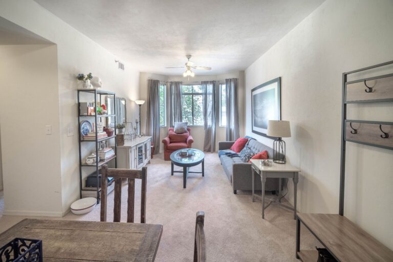 Living/dining room with large bay window