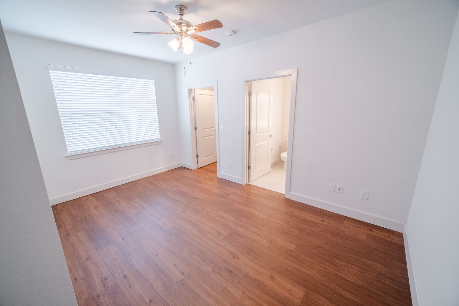 Wood-look flooring throughout the apartment
